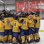 Photo by Megan Pacer/Homer News                                 Members of the Homer hockey team swarm goalkeeper Rhodes Turner in celebration after their 7-5 loss to Colony High School on Friday, Jan. 10, 2020 at Kevin Bell Arena in Homer, Alaska. With goalie Keegan Strong out, Turner stepped in, suited up and played in the position for the very first time in a varsity game.