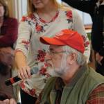 Randy Arndt asks Rep. Sarah Vance, R-Homer, a question at a town hall last Saturday, Jan. 11, 2020, at the Kachemak Bay Campus in Homer, Alaska. Legislative aide Lauren Simpson holds the microphone for Arndt. (Photo by Michael Armstrong/Homer News)