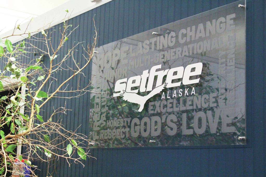 A sign for Set Free Alaska hangs in the faith-based addiction treatment nonprofits new outpatient servies location on Ocean Drive on Monday, Jan. 16, 2020 in Homer, Alaska. The organization held an open house to celebrate the outpatient services building opening. (Photo by Megan Pacer/Homer News)