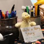 A station for writing stories and memories about a Homer man who was found dead this month after a water heater explosion rest on a table at his memorial Sunday, Jan. 19, 2020 at Homer High School in Homer, Alaska. Gary Thomas was a community volunteer and a volunteer firefighter for more than 40 years. (Photo by Megan Pacer/Homer News)