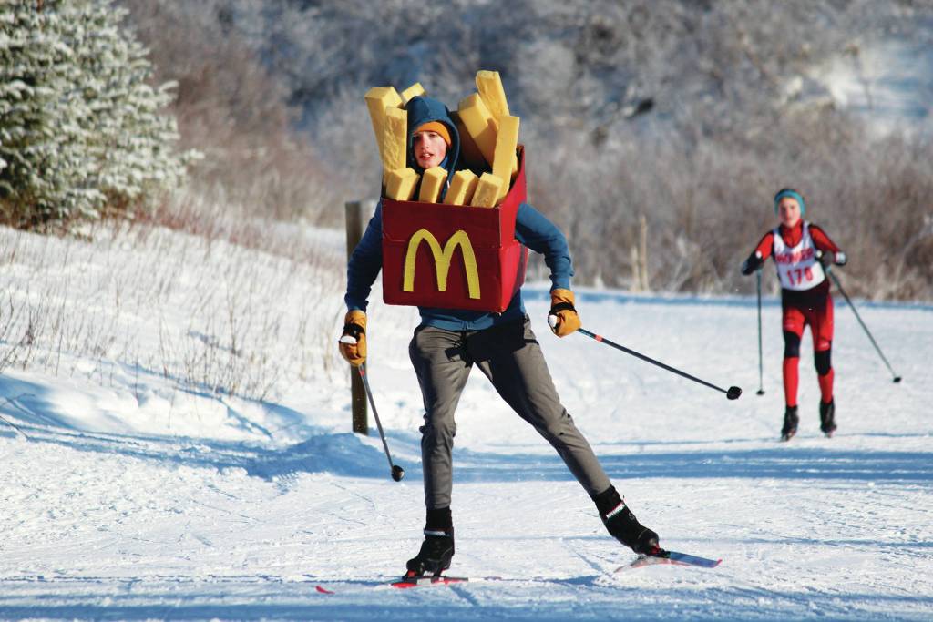 Homer junior varsity skier Seamus McDonough skates to the finish of the Saturday, Feb. 1, 2020 5-kilometer race during the Homer Invite at the Lookout Mountain Trails on Ohlson Mountain Road near Homer, Alaska. Skiers were given a 10 second penalty if they were not wearing a costume during Saturdays skate races. (Photo by Megan Pacer/Homer News)