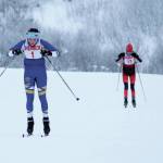 Homers Autumn Daigle skis to the finish of a Friday, Jan. 31, 2020 classic ski race ahead of Kenais Jayna Boonstra during the Homer Invite at the Lookout Mountain Trails on Ohlson Mountain Road near Homer, Alaska. (Photo by Megan Pacer/Homer News)