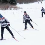 Three skiers dressed as referees ski up a hill during this years Ski for Women on Sunday, Feb. 2, 2020 at the Lookout Trails on Ohlson Mountain Road near Homer, Alaska. (Photo by Megan Pacer/Homer News)