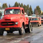 Classic and ice racing cars make their way down Pioneer Avenue during this years Homer Winter Carnival Parade on Saturday, Feb. 8, 2020 in Homer, Alaska. Ice races were held after the parade on Beluga Lake. (Photo by Megan Pacer/Homer News)