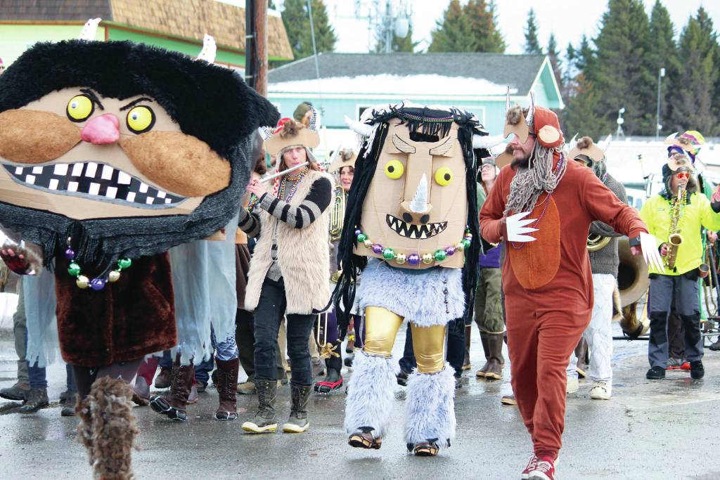 Members of the club Krewe of Gambrinus march in this years Homer Winter Carnival Parade on Saturday, Feb. 8, 2020 on Pioneer Avenue in Homer, Alaska. They marched dressed as wild things from Where the Wild Things Are. (Photo by Megan Pacer/Homer News)