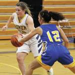 Galenas Julia Heckman tries to knock the ball away from Homers Rylee Doughty during a Friday, Feb. 7, 2020 basketball game during the Homer Winter Carnival Basketball Tournament at Homer High School in Homer, Alaska. (Photo by Megan Pacer/Homer News)