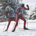 Kenais Mathew Grybowski and Nathan Haakenson climb a hill at the Kenai Peninsula Borough Nordic ski championships Saturday at Tsalteshi Trails just outside of Soldotna. (Photo by Jeff Helminiak/Peninsula Clarion)