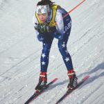 Soldotnas Erika Arthur cruises down a hill at the Kenai Peninsula Borough Nordic ski championships Saturday at Tsalteshi Trails just outside of Soldotna. (Photo by Jeff Helminiak/Peninsula Clarion)