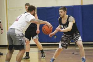 Adult league teams battle for basketball championship