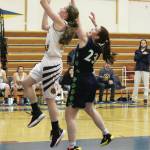 Redingtons Lexi Seymore follows Homers Laura Inama as she goes up for a basket during a Friday, Feb. 21, 2020 basketball game in the Alice Witte Gymnasium in Homer, Alaska. (Photo by Megan Pacer/Homer News)