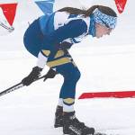 Homers Autumn Daigle double-poles late in the girls 7.5-kilometer classic race Friday at the Alaska state Nordic ski championships at Kincaid Park in Anchorage. (Photo by Joey Klecka/For the Clarion)
