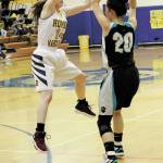 Homers Laura Inama pressures Nikiskis Tika Zimmerman during a Friday, Feb. 28, 2020 basketball game in the Alice Witte Gymnasium in Homer, Alaska. (Photo by Megan Pacer/Homer News)