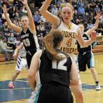 Kelli Bishop guards Nikiskis Kaycee Bostic during a Friday, Feb. 28, 2020 basketball game in the Alice Witte Gymnasium in Homer, Alaska. (Photo by Megan Pacer/Homer News)