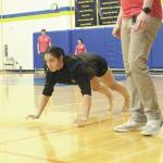 Sewards Chloe Lastimosa competes in the seal hop at the Kachemak Bay Traditional Games, a Native Youth Olympics invitational, on Saturday, March 7, 2020 at Homer High School in Homer, Alaska. (Photo by Megan Pacer/Homer News)