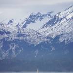 A sailboat cruises by the Spit on Saturday, April 18, 2020, in Homer, Alaska. (Photo by Michael Armstrong/Homer News)