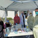 Staff with the Seldovia Village Tribe Health and Wellness Center and the Seldovia Village Tribal Administration conduct free COVID-19 testing Wednesday, April 29, 2020 in Seldovia, Alaska. (Photo courtesy Seldovia Village Tribe)