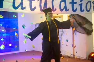 Esther Lowe poses for a photo at a reception for the Kachemak Bay Campus commencement last Wednesday, May 8, 2019, at the Mariner Theatre in Homer, Alaska. Lowe received an associate of arts degree. (Photo by Michael Armstrong/Homer News.)