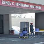 Kenai Peninsula Borough School District staff distribute student meal for lunch at Kenai Central High School on March 25, 2020, in Kenai, Alaska. (Photo by Victoria Petersen/Peninsula Clarion)
