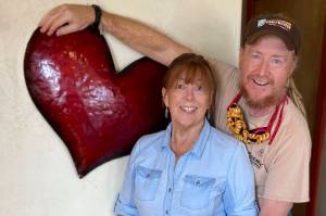 Michelle Wilson and Sean Hogan, pictured at their restaurant, Cosmic Kitchen in this undated photo, have announced they have sold the restaurant after 17 years of operating in Homer, Alaska. (Photo by Anna Buenting)