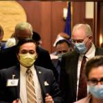 Peter Segall | Juneau Empire                                Sens. Scott Kawasaki, D-Fairbanks, and Bert Stedman, R-Sitka, leave the floor of the Alaska State Senate after voting to approve Gov. Mike Dunleavys distributions of over $1 billion in federal relief money. The senate adjourned sine diene, meaning indefinitely, closing out the 31st Legislature. Wednesday.