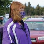 Kenai Peninsula Borough Assembly President Kelly Cooper listens to Memorial Day observances held at the Hickerson Memorial Cemetery on Diamond Ridge near Homer, Alaska, on Monday, May 25, 2020. (Photo by Michael Armstrong/Homer News)