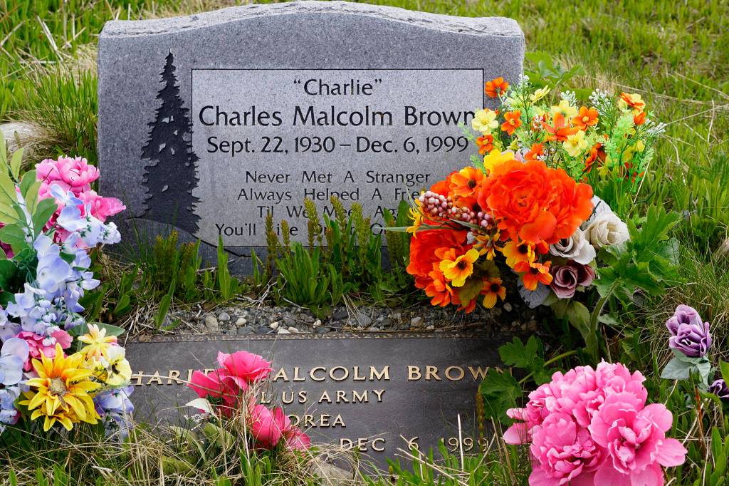 Korean War veteran Charles Charlie Browns grave is one of many veterans who are buried in the Hickerson Memorial Cemetery on Diamond Ridge near Homer, Alaska. Memorial Day observances were held at the cemetery on Monday, May 25, 2020. (Photo by Michael Armstrong/Homer News)