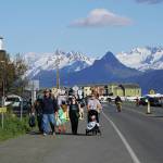 Visitors walk along the Homer Spit on Sunday, May 24, 2020, during the Memorial Day weekend in Homer, Alaska. (Photo by Michael Armstrong/Homer News)