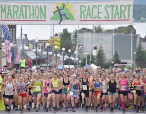 Jeff Helminiak / Peninsula Clarion                                The womens field takes to the course Tuesday, July 4, 2017, at the Mount Marathon Race in Seward. Eventual winner Allie Ostrander is to the right of Christy Marvin (1).