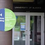 A sign on the University of Alaska Southeast campus in Juneau. Under a proposal being put before the UA Board of Regents next week, UAS could be merged with one of the other two schools in the system. (Peter Segall | Juneau Empire)