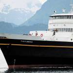 Crew members move about the bow of the M/V Tustumena as it pulls into the Homer Harbor on Monday, June 8, 2020 in Homer, Alaska. A member of the crew tested positive for COVID-19 on Saturday when the state ferry was docked in Dutch Harbor, and most of the crew and six passengers who had boarded in Homer were quarantined while the ship returned. Local health workers performed COVID-19 tests on the crew and passengers upon docking, and they were only allowed to disembark if they had private transportation to their final quarantine destination. (Photo by Megan Pacer/Homer News)