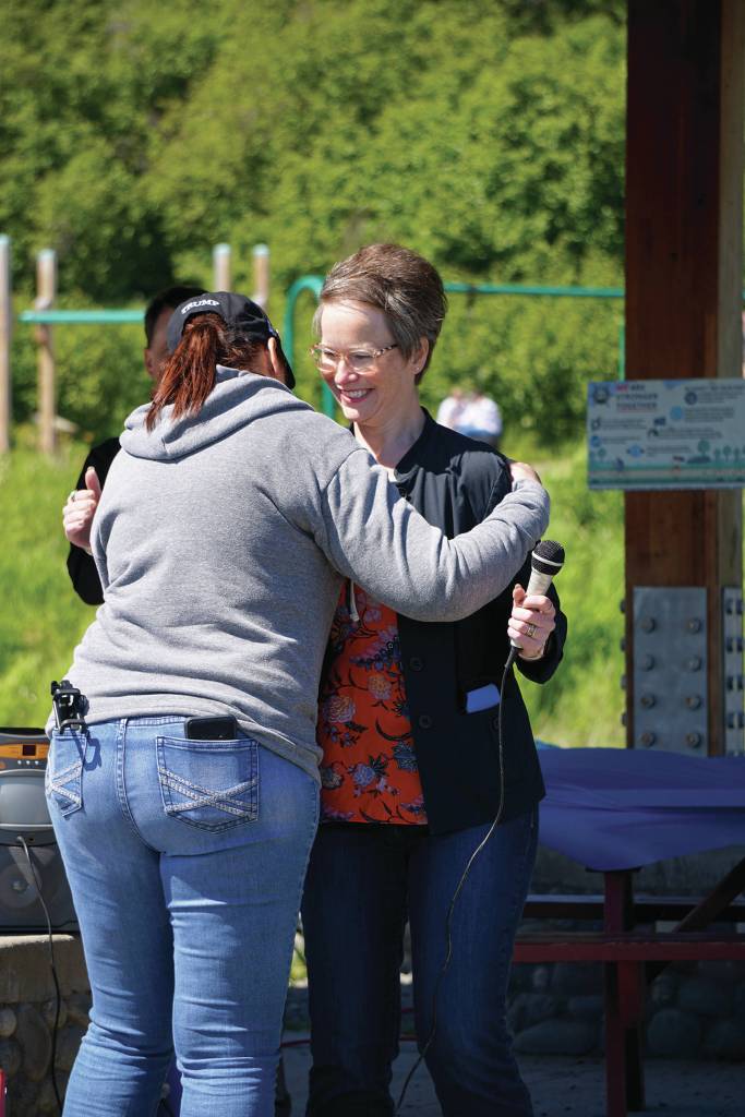 Cassie Lawver, left, hugs Rep. Sarah Vance, R-Homer, after Lawver introduced her at a kickoff for Vances re-election campaign on Sunday, June 14, 2020, at Karen Hornaday Park in Homer, Alaska. (Photo by Michael Armstrong/Homer News)