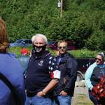 A man wearing a Trump 2020 face mask listens to Rep. Sarah Vance, R-Homer, at a kickoff for her re-election campaign on Sunday, June 14, 2020, at Karen Hornaday Park in Homer, Alaska. (Photo by Michael Armstrong/Homer News)