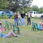 Some people sit and listen while others dance to faith music during the first ever Juneteenth celebration in Homer, held Friday, June 19, 2020 at WKFL Park in Homer, Alaska. (Photo by Megan Pacer/Homer News)