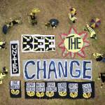 Members of Mavis Mullers BEE the change art project pose for a drone photograph on July 5, 2020, at Mullers home in Homer, Alaska. (Photo by John Newton)