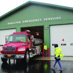 Ninilchik Fire Chief David Bear moves the fire truck out of the new Ninilchik Emergency Services building on Aug. 9, 2014, to make room for visitors to the open house of the new NES building. (Homer News file photo)