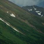 A patch of heart-shaped snow clings to the side of the Kenai Mountains on Tuesday, July 21, 2020, near Hope, Alaska. (Photo by Michael Armstrong/Homer News)