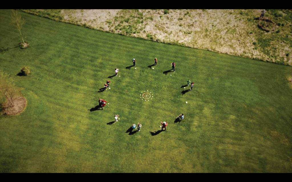 Members of the Homer Youth String Orchestra Club perform for a group video, Playing Together Apart, on May 15, 2020, in Homer, Alaska. (Drone footage by Scott Dickerson; video still courtesy of Homer Youth String Orchestra Club)