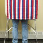 A voter fills out his ballot during the Primary Election on Tuesday, Aug. 18, 2020 at Homer City Hall in Homer, Alaska. (Photo by Megan Pacer/Homer News)