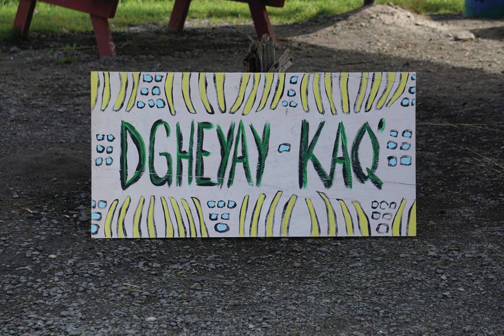 A sign at Land Acknowledgement in Action: Sign Installation shows the DenaIna words for Anchorage at the event last Saturday, Aug. 22, 2020, at the Bishops Beach pavillion  the area known by the Denaina people as Tuggeht, or at the waters edge. (Photo by Michael Armstrong/Homer News.
