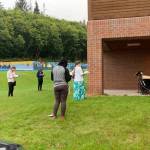 Members of the Homer Swing Choir practice outdoors on the first day of school, Monday, Aug. 24, 2020 at Homer High School in Homer, Alaska. (Photo courtesy Homer High School)