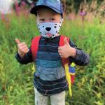 Austin Lake, a Kindergartener, shows off his mask for the first day of school at Little Fireweed Academy on Monday, Aug. 24, 2020 in Homer, Alaska. (Photo courtesy Janet Bowen, Fireweed Academy)