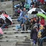 Mariner fans  some wearing masks and social distancing  endure a heavy rain at a Saturday, Aug. 29, 2020 football game against Seward High School in Homer, Alaska. (Photo by Michael Armstrong/Homer News)