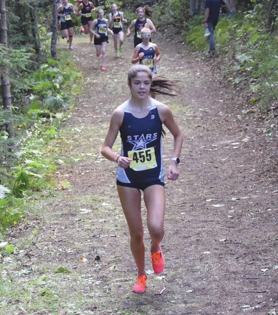 Erika Arthur takes control of the junior-senior girls race right from the start Friday, Sept. 4, 2020, at the Nikiski Class Races at Nikiski High School in Nikiski, Alaska. (Photo by Jeff Helminiak/Peninsula Clarion)