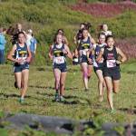 Kenais Emilee Wilson leads a group of runners up a hill during the varsity girls 5 kilometer race Friday, Sept. 11, 2020 at the Lookout Mountain Trails near Homer, Alaska. (Photo by Megan Pacer/Homer News)