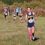 Homers Frida Renner claims fourth place ahead of a group of other runners during the girls varsity 5 kilometer race Friday, Sept. 11, 2020 at the Lookout Mountain Trails near Homer, Alaska. (Photo by Megan Pacer/Homer News)