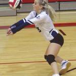 Homers Sela Weisser digs up a ball against Kenai Central on Friday, Sept. 18, 2020, at Kenai Central High School in Kenai, Alaska. (Photo by Jeff Helminiak/Peninsula Clarion)