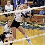 Homers Gracie Gummer spikes the ball during a Tuesday, Sept. 22, 2020 volleyball game against Soldotna High School in the Alice Witte Gymnasium in Homer, Alaska. (Photo by Megan Pacer/Homer News)