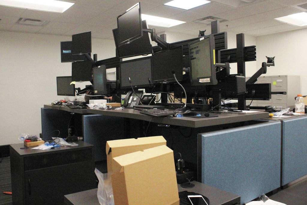 The dispatch center of the new Homer Police Station, seen here on Thursday, Sept. 24, 2020 in Homer, Alaska, is partially set up. The desks are able to be moved for either sitting or standing, and the new station was able to add a third dispatcher station, as opposed to the two dispatcher stations in the old building. (Photo by Megan Pacer/Homer News)