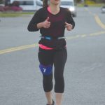 Homers Stacey Buckelew runs to victory in the Kenai River Marathon on Sunday, Sept. 27, 2020, in Kenai, Alaska. (Photo by Jeff Helminiak/Peninsula Clarion)