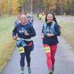Kenais Sarah Pribbenow and Antonya Hall run the half marathon at the Kenai River Marathon on Sunday, Sept. 27, 2020, on Beaver Loop Road in Kenai, Alaska. (Photo by Jeff Helminiak/Peninsula Clarion)